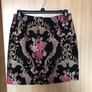 A flower embroidered mini skirt